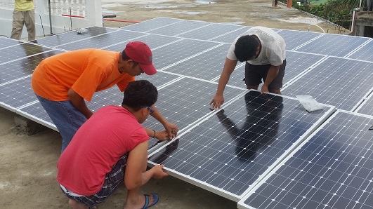 Solar panels being fitted to Batanes General Hospital.